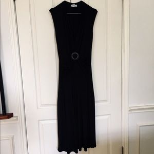 Long black dress with draped V-neck line